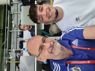 Football Statistician Marshall Gillespie with his son at a Northern Ireland match